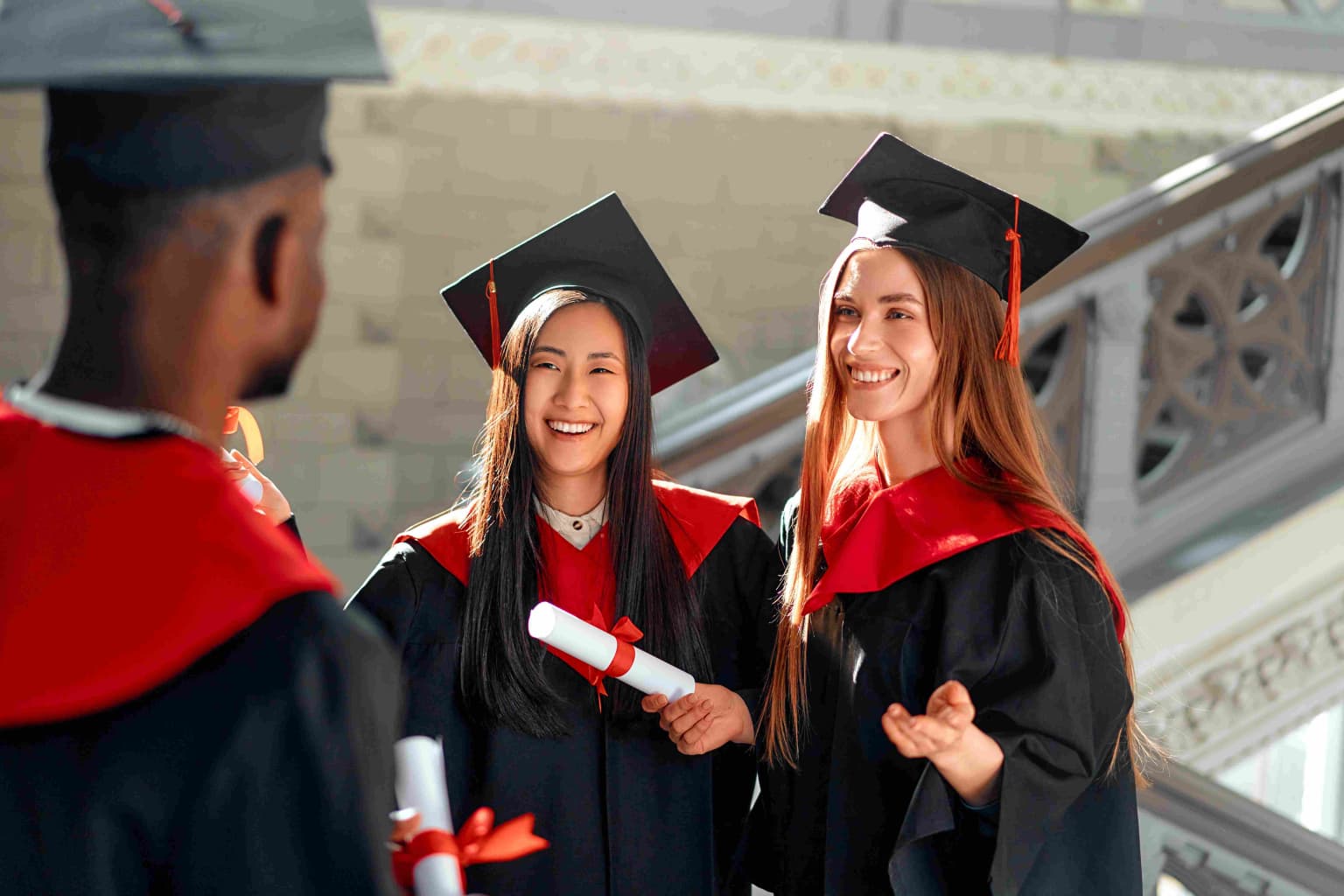 diverse-group-of-happy-students-graduating-holdin-2024-06-11-19-48-11-utc-compressed