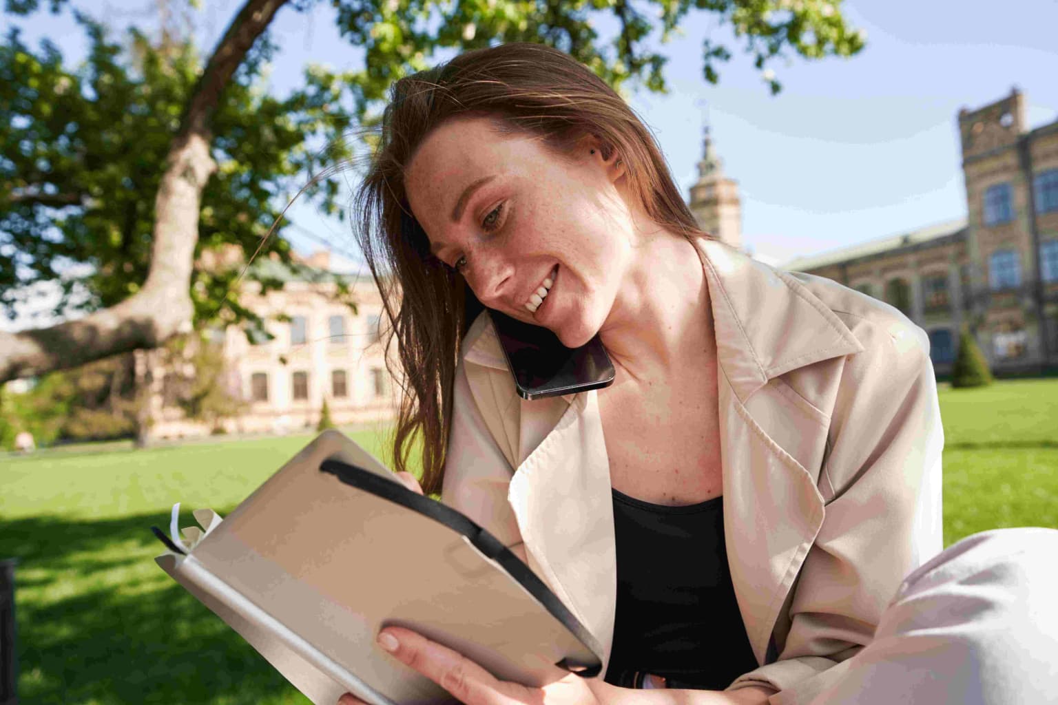 lady-is-sitting-on-a-park-bench-and-reading-book-2023-11-27-05-17-43-utc-compressed