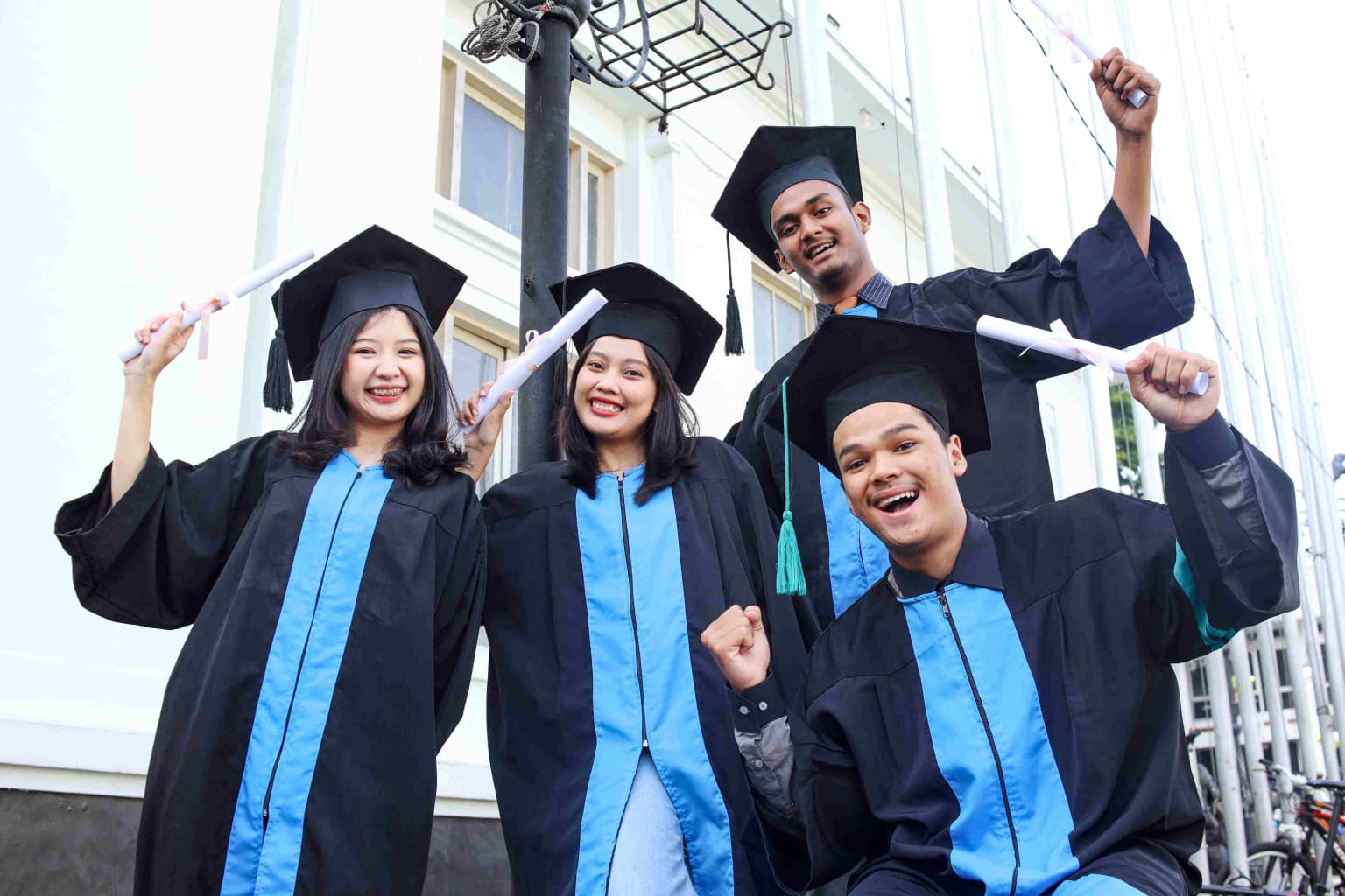 group-of-graduated-students-celebrate-their-diplom-2023-11-27-05-12-17-utc-compressed-1