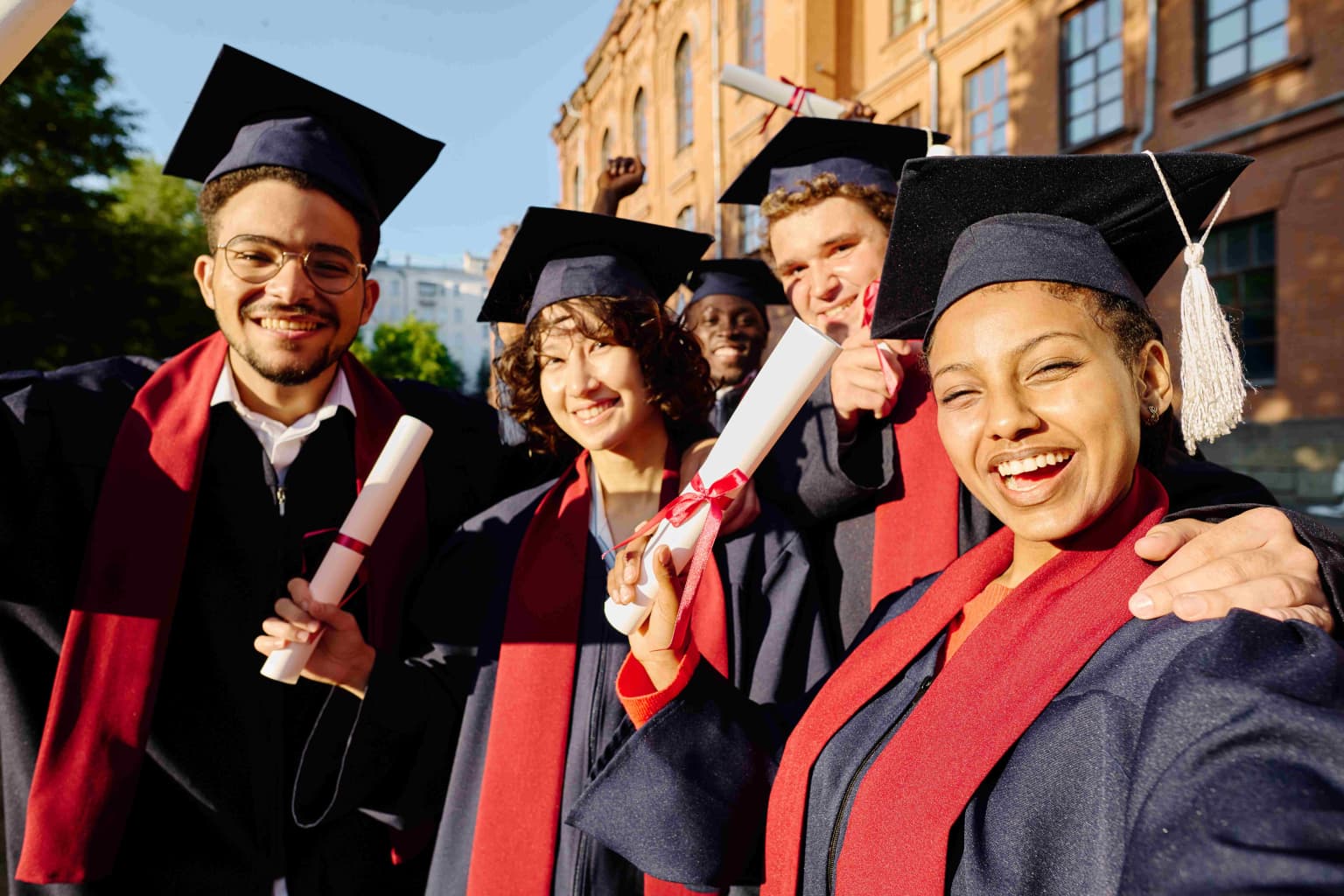 happy-graduated-students-making-selfie-portrait-2023-11-27-04-49-38-utc-compressed