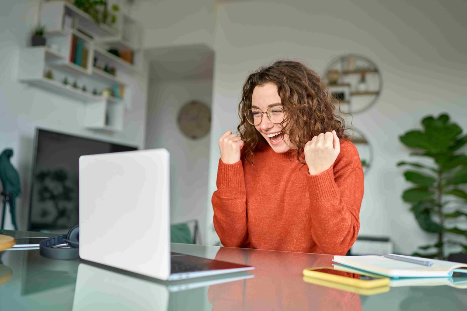 happy-girl-winner-looking-at-laptop-receiving-good-2023-11-27-05-36-44-utc-compressed