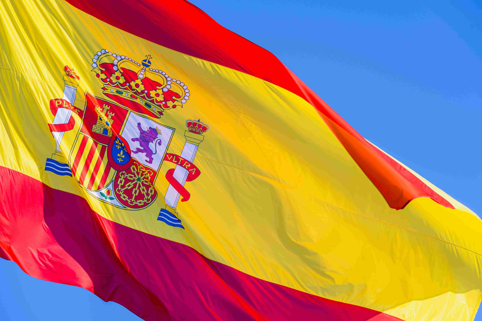 red-and-yellow-spain-flag-with-royal-shield-waving-2024-10-19-21-45-20-utc-compressed